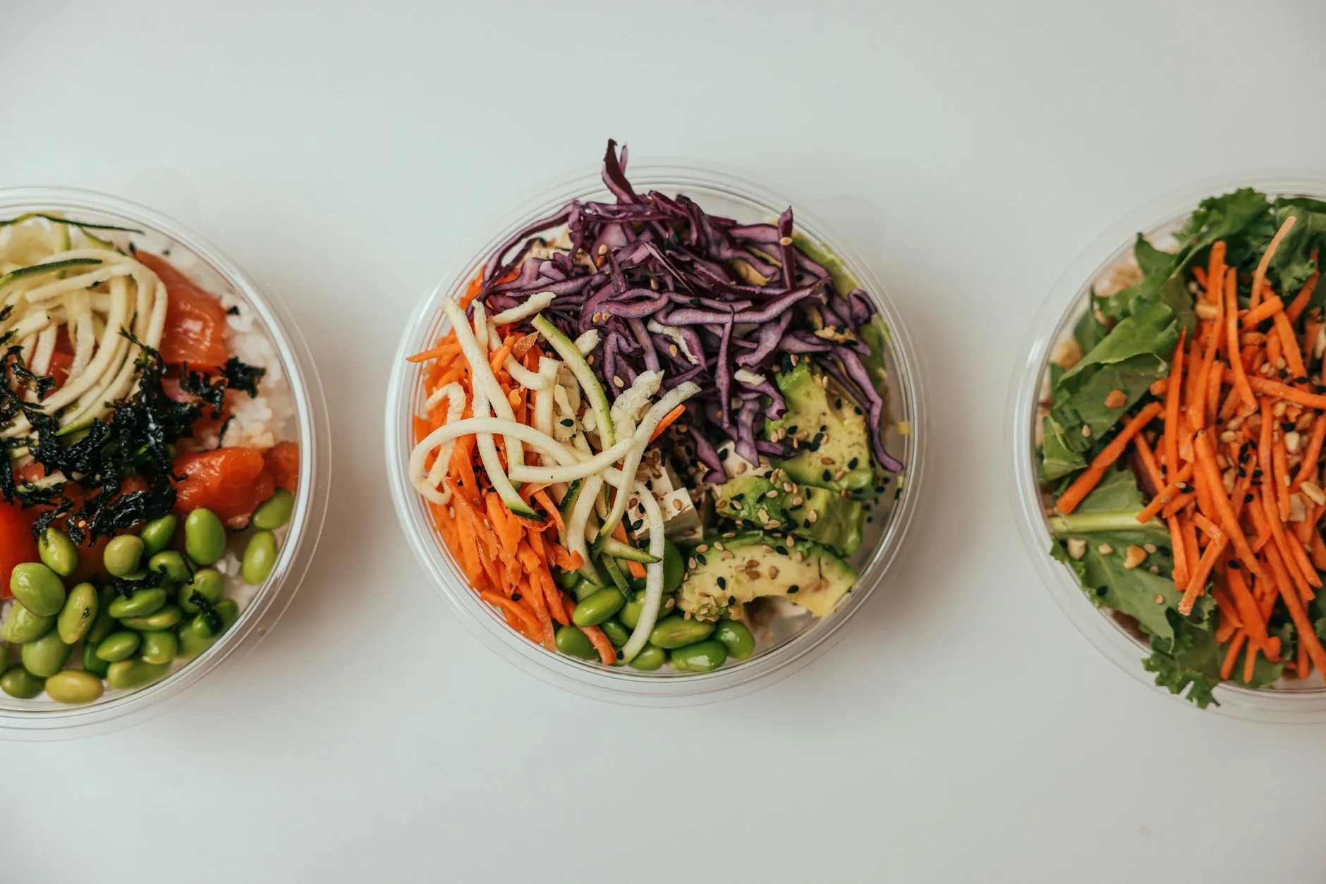 Protein-rich foods arranged on rustic wooden board, soft natural lighting, muted colors.